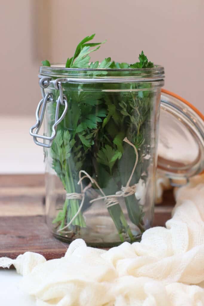 Bouquet garni bundles in glass jar